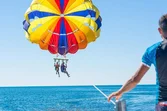Soar above turquoise waters